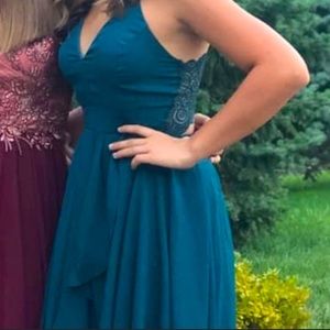 Glue/green dress, thin straps and open lace back.